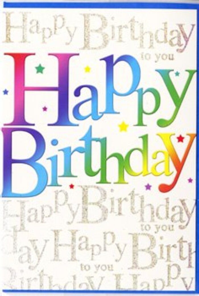 The birthday card pictured feels like the paper equivalent of a joyful toast, the kind you might give along with a vibrant arrangement on its way from a South Croydon florist to a home off Selsdon Road. Front and centre, the words Happy Birthday stretch boldly from left to right in large, confident lettering. Each letter holds its own distinctive colour-crimson red, tangerine, sunny yellow, leaf green, teal, sapphire, and plum-yet they blend at the edges in soft gradients, suggesting movement and celebration, like ribbons curling above a party table. The typeface is rounded and inviting, without sharp corners, giving the greeting a friendly, modern personality that feels suitable for any age. The surface of the letters appears smooth and almost satin-like, reflecting light gently, much as the petals of fresh blooms shimmer in a South Croydon flower shop window. Behind this exuberant message, the background is alive with subtle, repeated lines of golden handwriting, the words Happy Birthday to you flowing in continuous loops. The fine script creates an elegant backdrop, reminiscent of hand-written notes or calligraphy, and the metallic gold ink adds a refined sparkle, like sunlight glancing off jewellery. Though the gold is plentiful, it remains understated, allowing the rainbow headline to remain the clear focus, while still enveloping the card in warmth. Tiny flecks and flourishes of gold give the impression of confetti and streamers, quietly echoing the excitement of a birthday gathering. The design overall feels both festive and thoughtful, as if chosen to sit beside a colourful birthday bouquet on a dining table somewhere in South Croydon, turning a simple greeting into a keepsake.