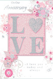 This anniversary card is portrayed as a gentle celebration of lasting romance, its design unfolding in a symphony of pastel pinks, silvery greys, and soft whites that call to mind the subdued elegance of a hand-arranged bouquet delivered across South Croydon. At its centre, the word LOVE is spelled in raised, softly sparkling glitter, with the letter O replaced by a shimmering heart finished in textured silver, creating both a visual and tactile focal point. Surrounding this central motif, delicate blossoms in blush and mauve unfurl with a watercolour softness, their edges defined by fine, flowing lines that mimic the natural curve of petals and trailing stems. Tiny flourishes-petals, curls of vine, and subtle butterfly silhouettes-drift around the flowers, adding a sense of motion and whimsical grace, like petals caught in a light breeze in a quiet South Croydon garden. The background is a gentle blush pink, smooth and unbroken, allowing the silver and glittered elements to stand out without overwhelming the eye. In elegant, understated script, the front and inner text read On Our Anniversary and I love you today and always, words that feel deeply personal, as if spoken softly across a candlelit table. The overall composition carries a feeling of treasured intimacy and carefully curated beauty, much like selecting a bespoke anniversary bouquet from a trusted local florist. It is the kind of card you might tuck alongside fresh roses and lilies on an anniversary delivery, a keepsake that whispers of shared journeys, quiet devotion, and the promise of many more years to come.